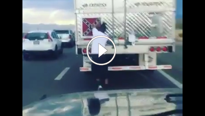 Man removes Confederate Flag on a truck