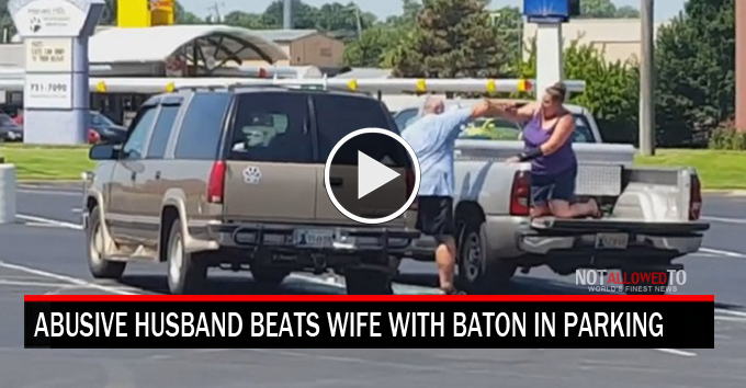 husband beats wife with baton